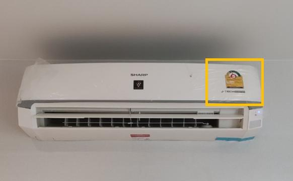 A white machine with a yellow label

AI-generated content may be incorrect.