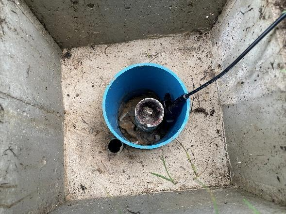 A blue pipe in a concrete square

AI-generated content may be incorrect.