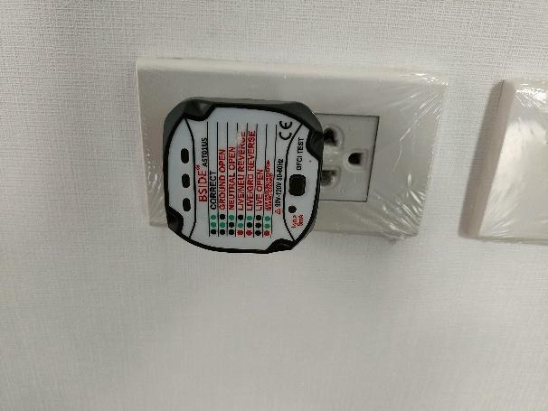 A white outlet with a black and red label

AI-generated content may be incorrect.