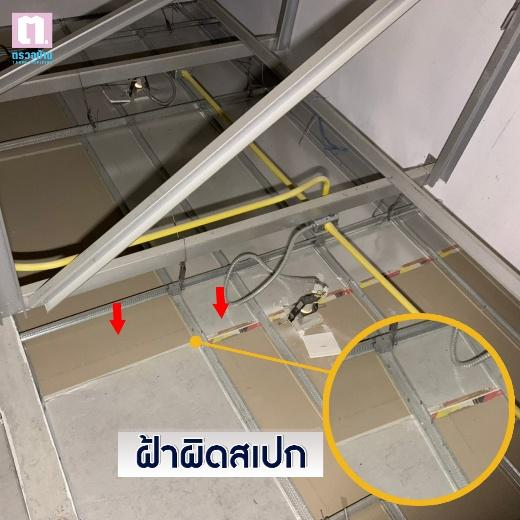 A metal frame with wires and yellow arrows

AI-generated content may be incorrect.