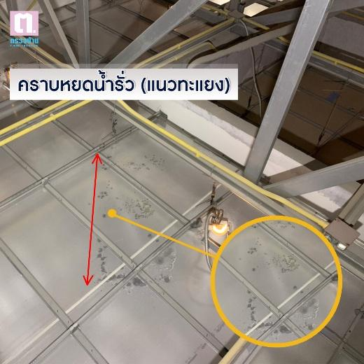 A metal ceiling with yellow lines and red arrows

AI-generated content may be incorrect.