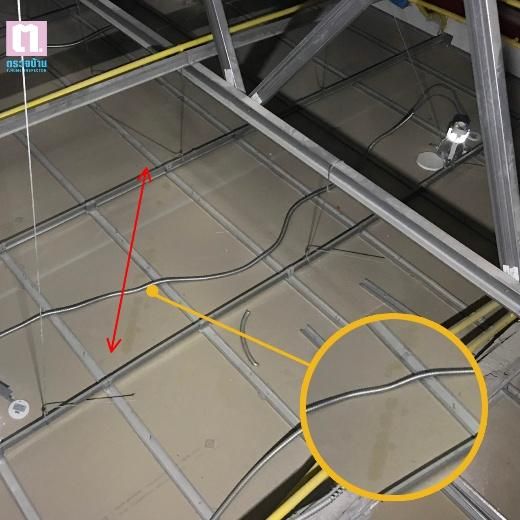 A metal frame with wires and a yellow circle

AI-generated content may be incorrect.