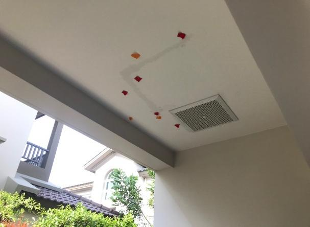 A ceiling with red and orange squares on it

AI-generated content may be incorrect.